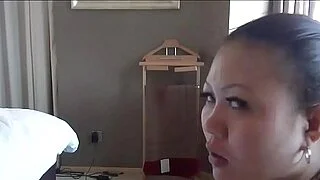 Asian babe gives deep throat blowjob